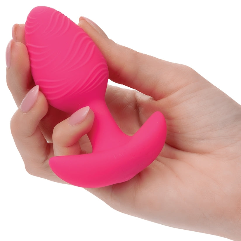 CHEEKY VIBRATING GLOW-IN-THE-DARK BUTT PLUG